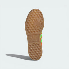 View of the translucent gum rubber outsole, detailing the classic traction pattern and the semi-clear finish.