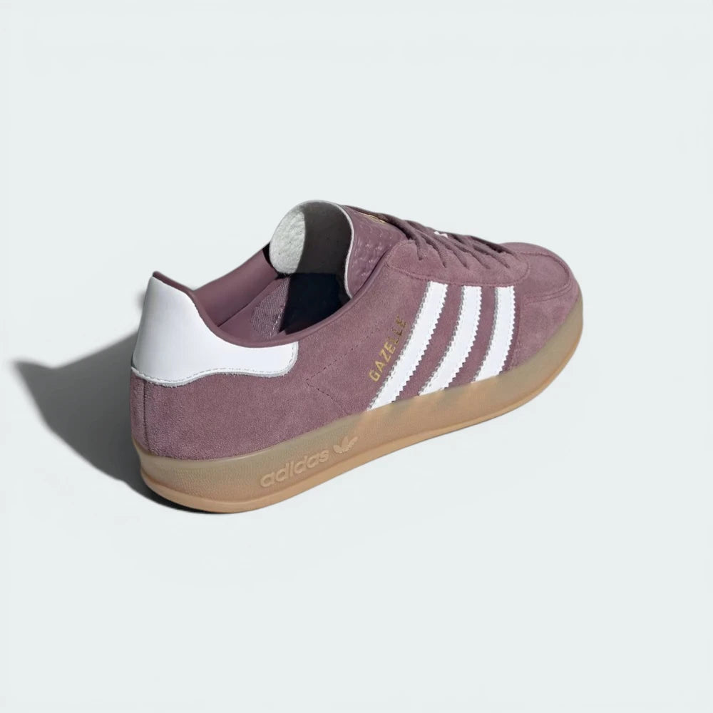 Rear view of the shoes, focusing on the white leather heel patch and the low-cut athletic silhouette.