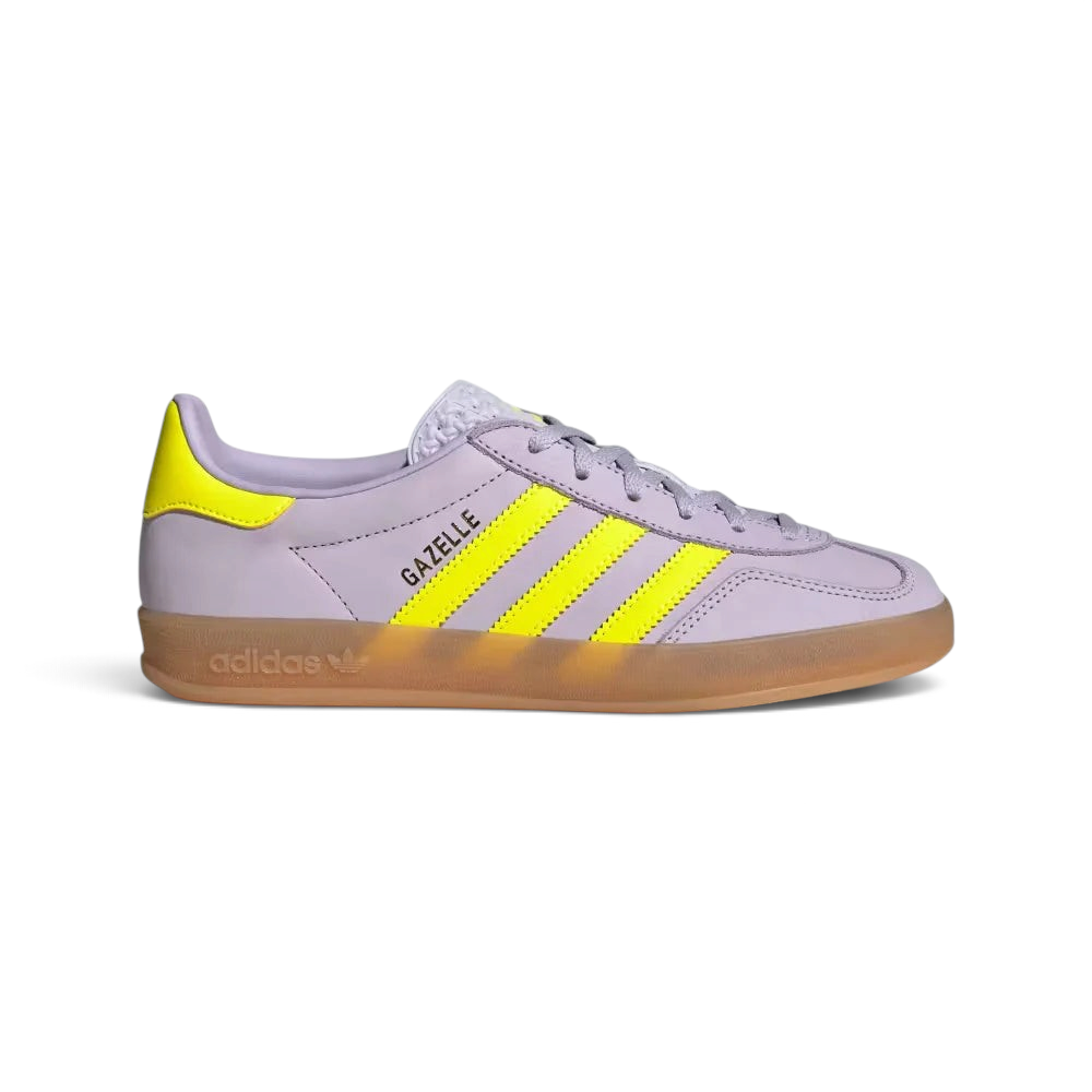 Side Profile Image: The Silver Dawn nubuck Gazelle, highlighting the electric Solar Yellow 3-Stripes and the translucent gum rubber sole.