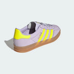 View from Behind Looking at the Heel: Focusing on the Solar Yellow heel tab and the way the gum sole wraps around the rear.