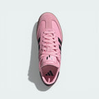 Top-down view of the Inter Miami edition boots, highlighting the pink leather upper, suede T-toe, and the Messi logo on the tongue.