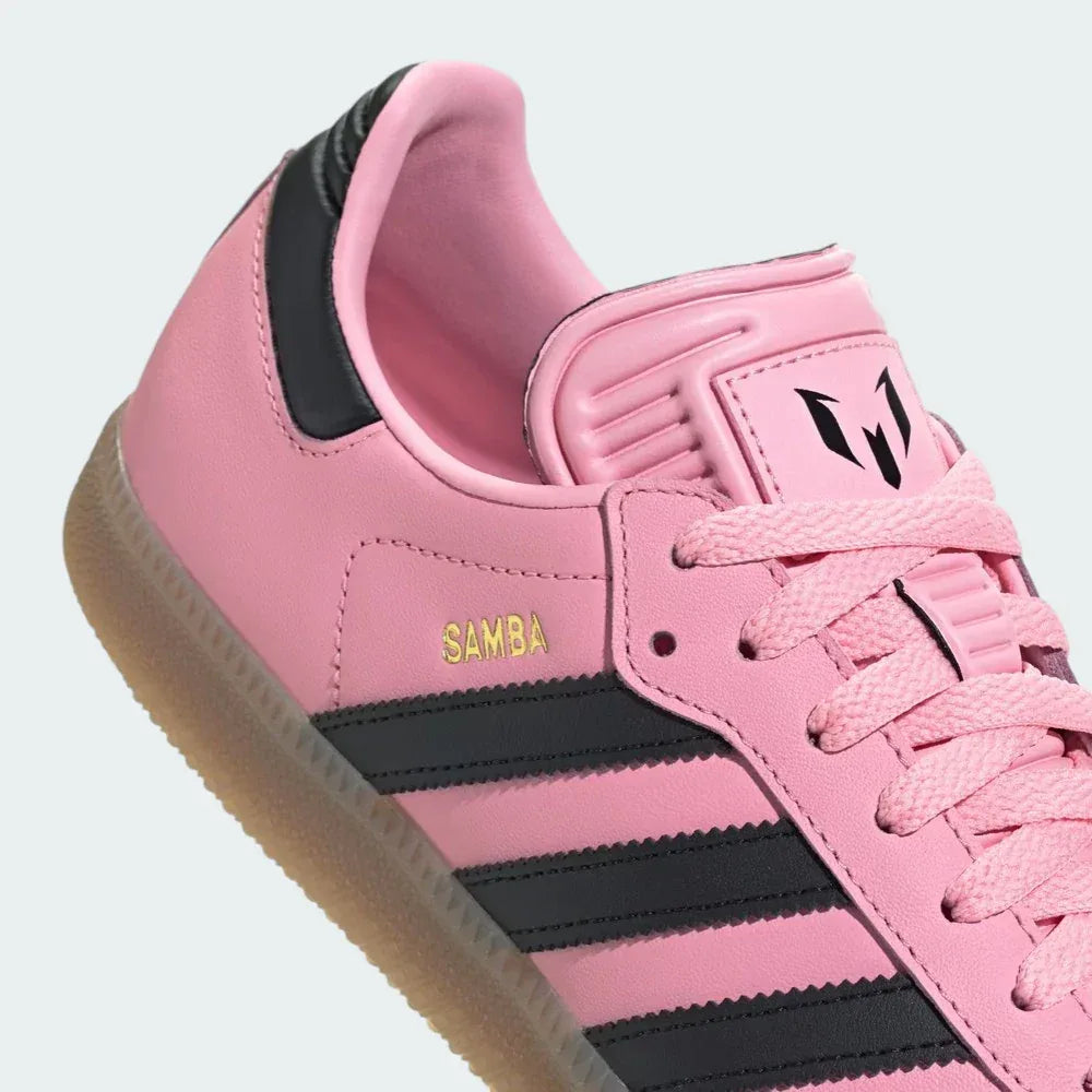Detailed zoom on the junction between the pink upper and the gum sole, showing the durable stitching and the heritage gum rubber finish.