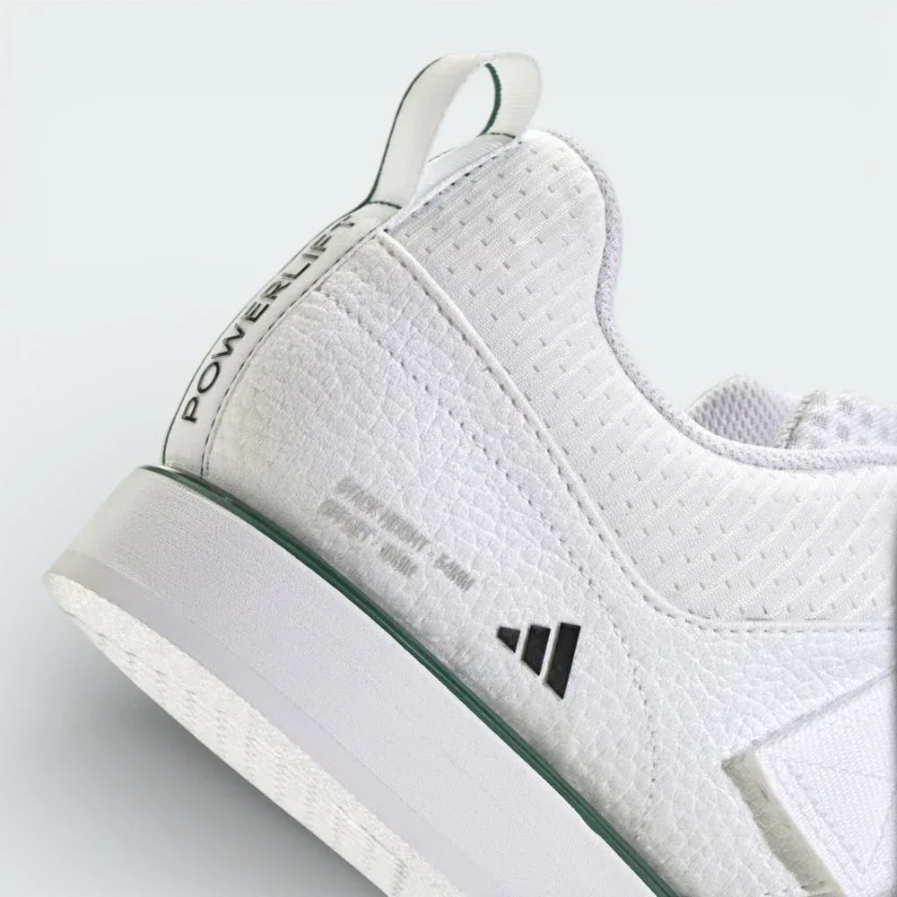 Detailed zoom on the midsole wedge and outsole edge, highlighting the durable construction and the firm lifting platform.