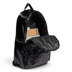 Inside view of the Adidas Puffy Satin Backpack open, showing the spacious main compartment and polyester lining.