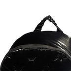 Adidas Puffy Satin Backpack in black zoomed in showing the zip and carry handle