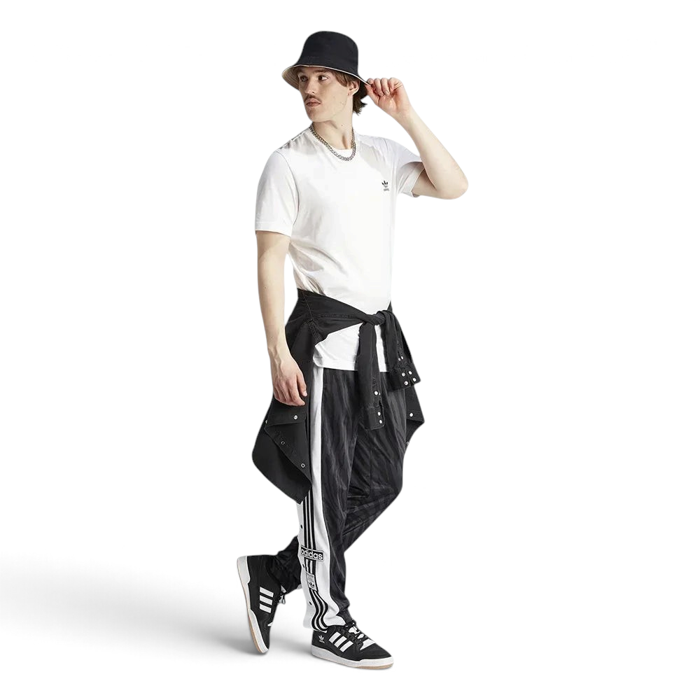 Adidas Adibreak Button Track Pants in black with a subtle animal print, front view showing the elastic drawcord waist and the full line of snap buttons down the side. Main image