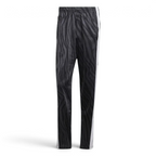 Adidas Adibreak Button Track Pants in black with a subtle animal print, front view showing the elastic drawcord waist and the full line of snap buttons down the side.