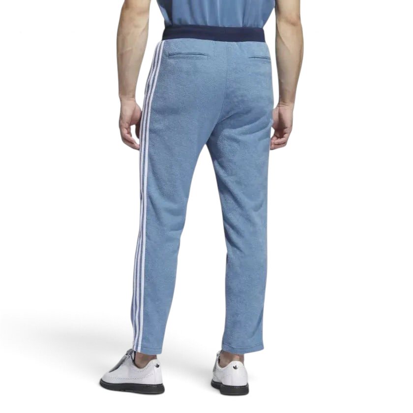 Adidas x Bogey Boys Golf Men's Track Pants in blue, back view showcasing the tapered leg design and classic fit.