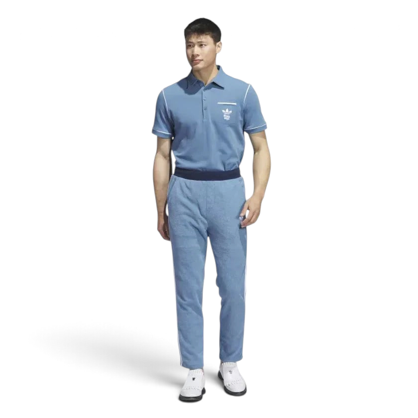 Adidas x Bogey Boys Golf Men's Track Pants in blue, full profile showing the full length, tapered leg, and collaborative branding.