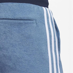 Detailed zoom on the elastic waistband with drawcord or the ankle cuff of the Adidas x Bogey Boys Golf Track Pants, highlighting the adjustable fit and clean finish.