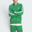 Highlights the high-velocity sweep of the continuous white 3-Stripes running flawlessly down the professional, deep emerald depth of the Green sleeve panels.