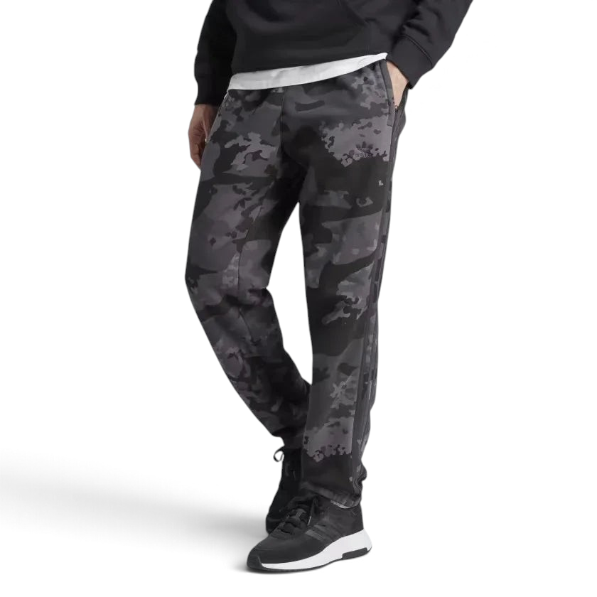 A pair of Adidas men's camouflage sweat pants with elastic waistband and zip pockets, in a gray and black color scheme.