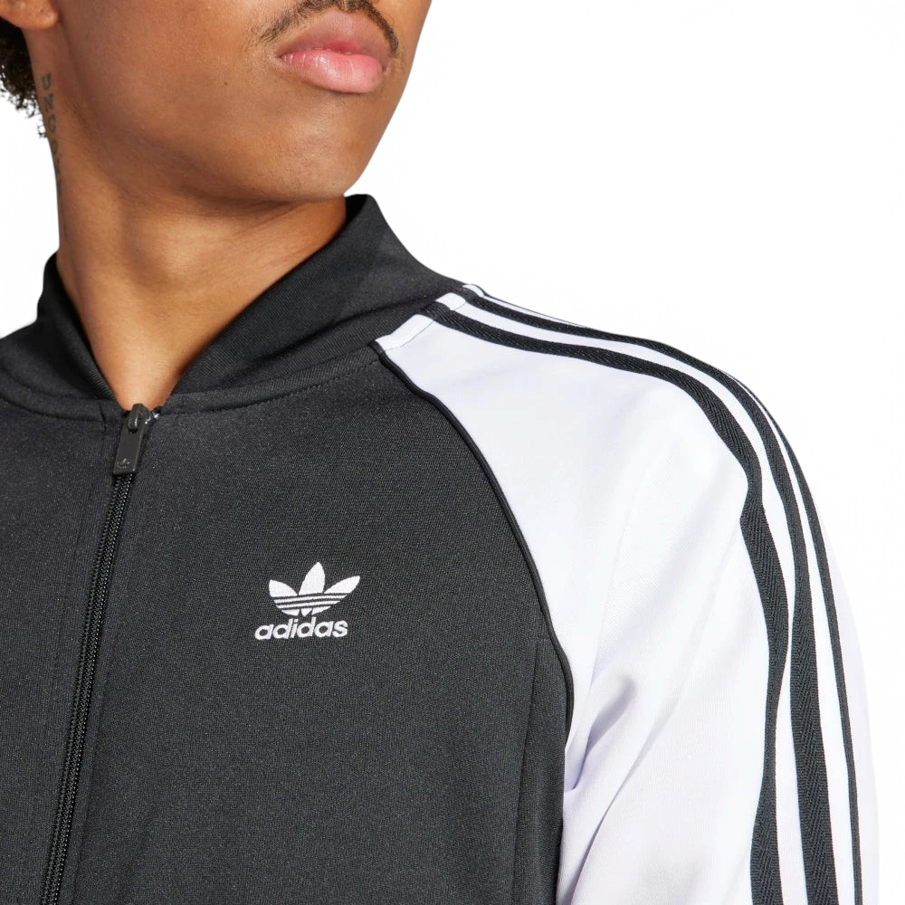 Details the premium technical double-knit microtexture of the cotton-poly interlock and the high-density border stitching.