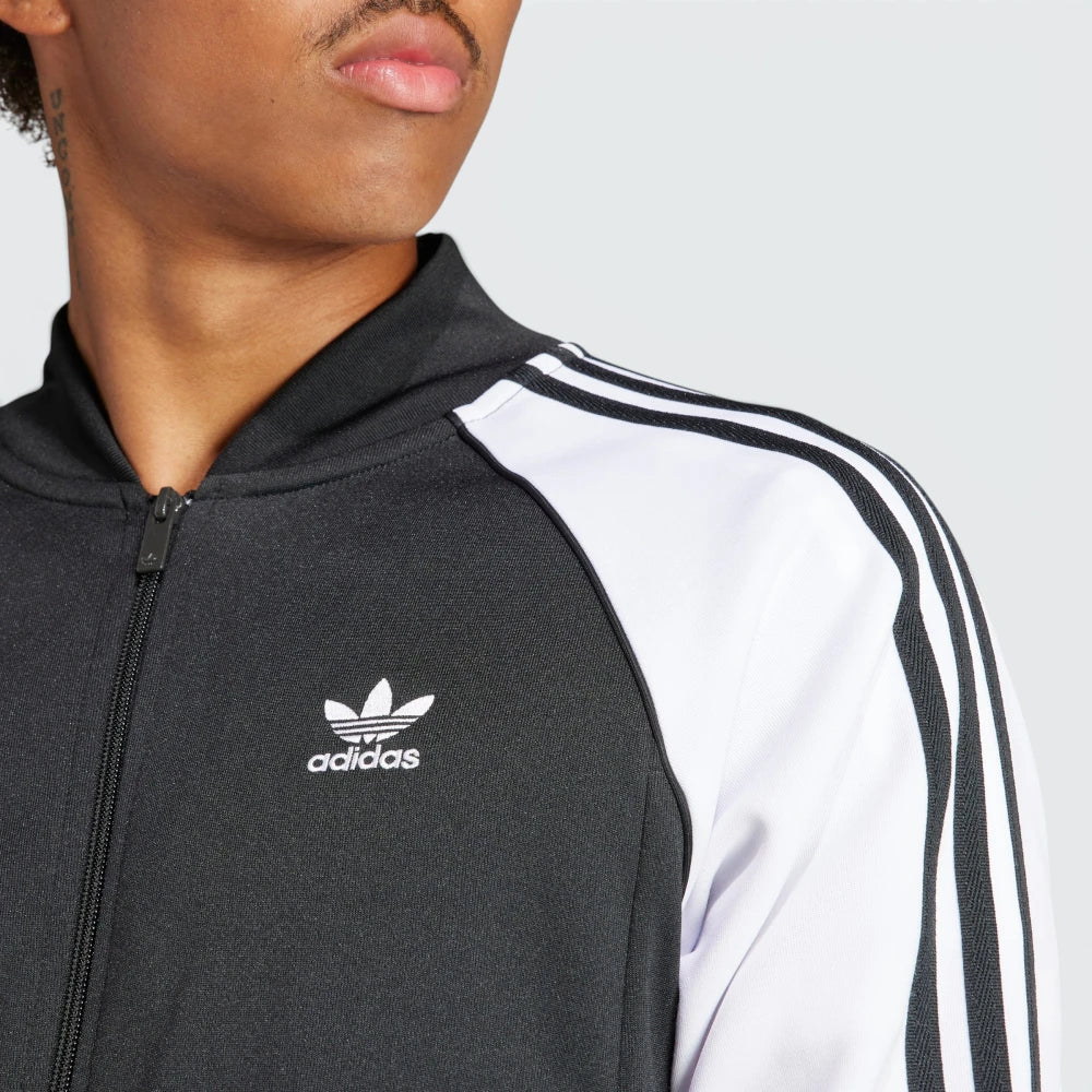 Details the premium technical double-knit microtexture of the cotton-poly interlock and the high-density border stitching.