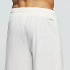 White adidas Badge of Sport Basketball shorts back shown on an invisible mannequin 
