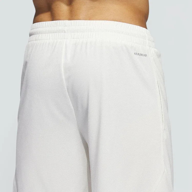 White adidas Badge of Sport Basketball shorts back shown on an invisible mannequin 