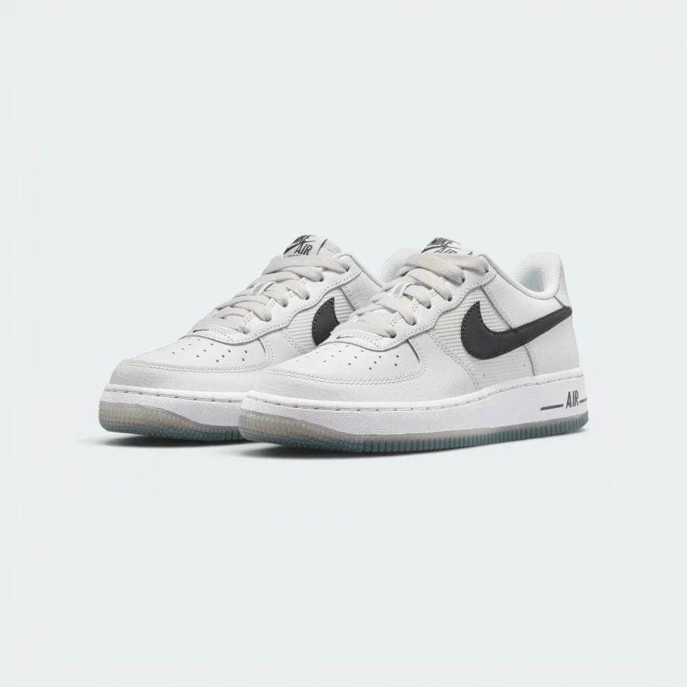 Emphasising the iconic, boxy retro basketball stance and the professional harmony of the modern grey tonal panel arrangement.