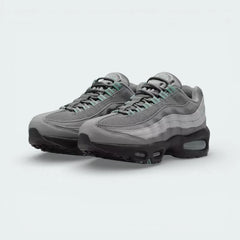 Captures the transition of the Smoke Grey gradient and Cannon blue hits.