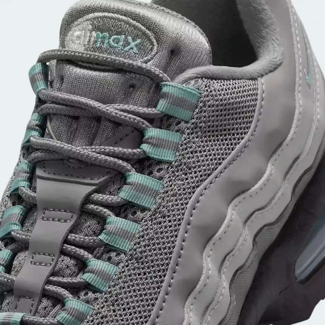 Details the "rib" lace loops and the reinforced toe cap.