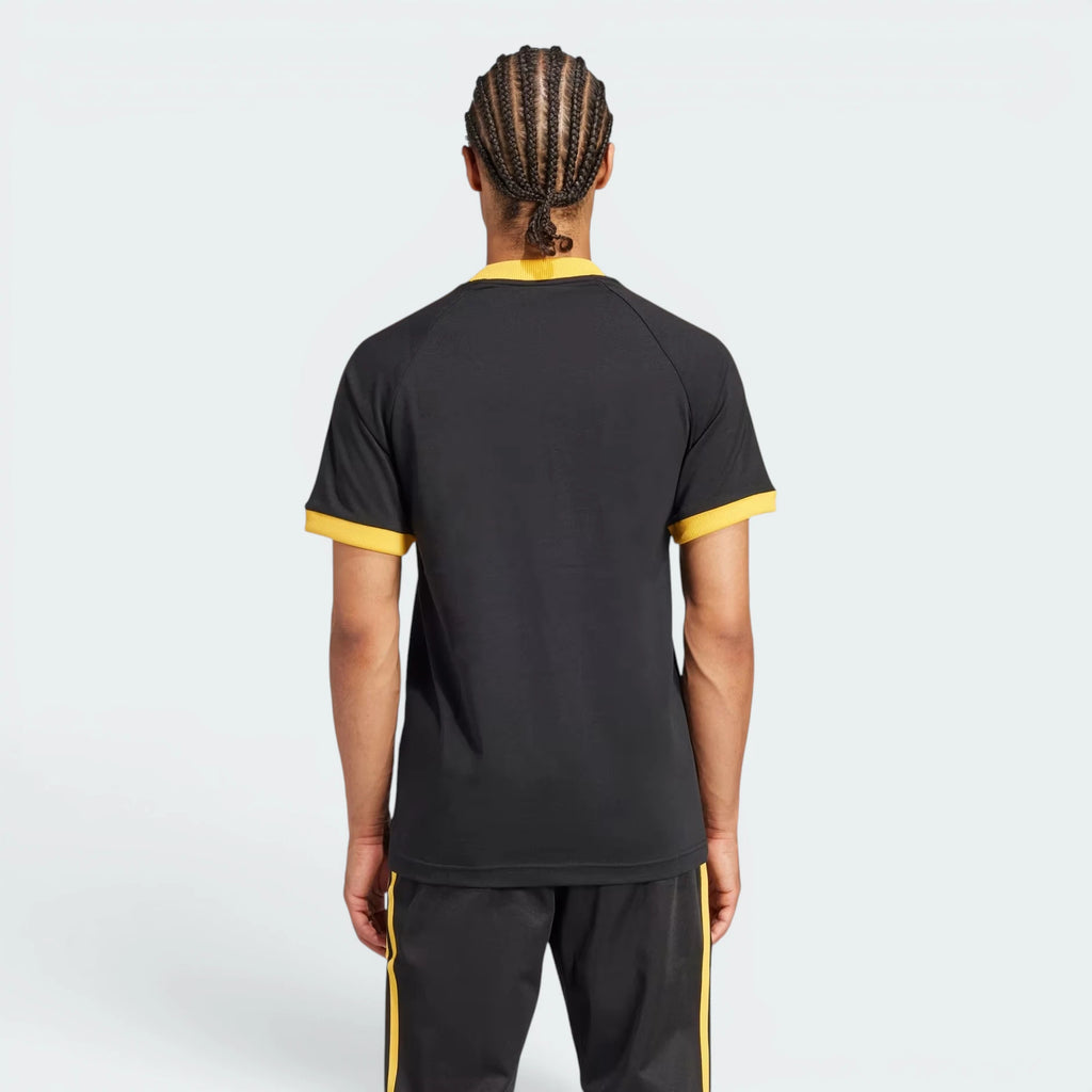 Focuses on the clean, uninterrupted hang of the black fabric across the spine and the flawless finish of the bottom hem.