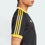 Highlights the "unreal" low-profile finish of the short sleeve hems and the stable fabric integration.