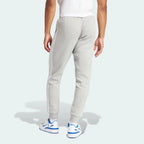 Rear view of the joggers, highlighting the clean finish and the structured fit across the seat and calves.