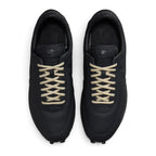 Highlighting the symmetrical central lacing throat, flat tonal laces, vintage-treated foam tongue with classic Nike branding tab, padded collar lining, and cushioned dark sockliner, demonstrating the upper template constructed for a comfortable "locked-in" fit.