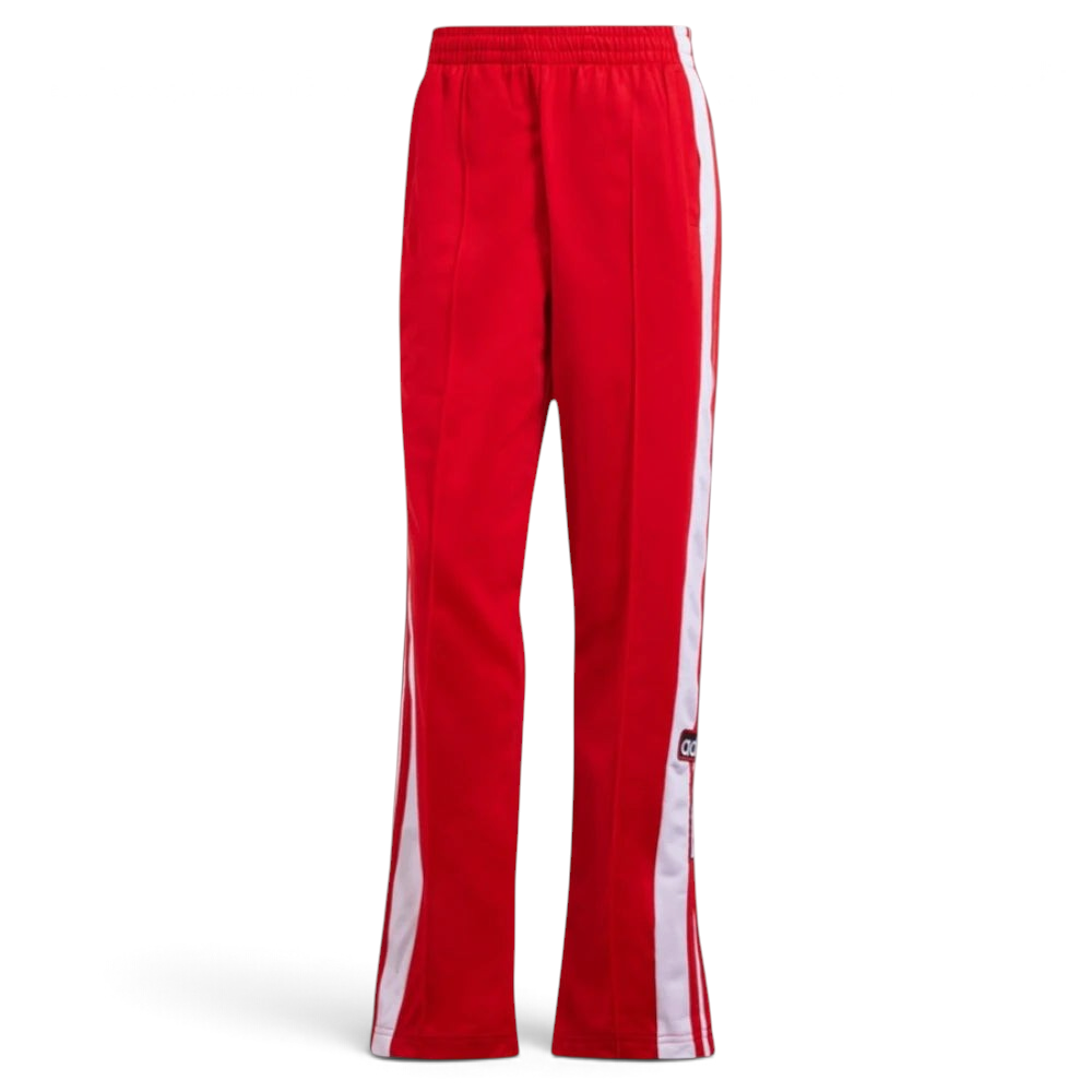 Top-down view of the track bottoms laid flat, showcasing the elasticated drawstring waist and the vibrant red tricot fabric.