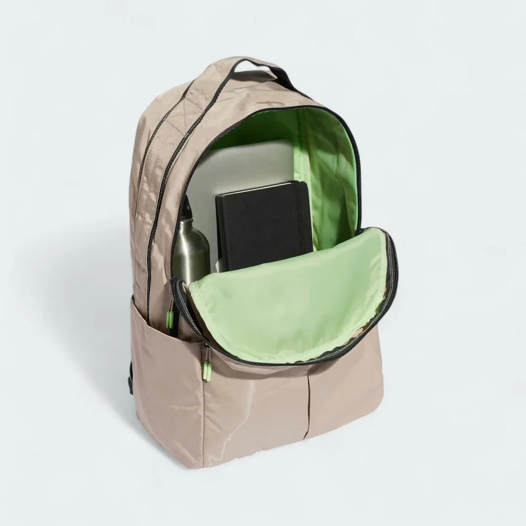 Inside view of the Adidas Women's Workout Backpack Yoga Bag open, showing laptop sleeve, spacious interior, and organizational pockets.