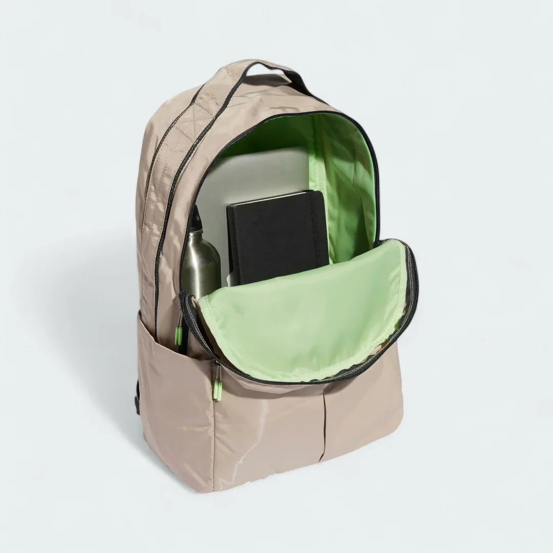 Inside view of the Adidas Women's Workout Backpack Yoga Bag open, showing laptop sleeve, spacious interior, and organizational pockets.