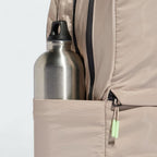 Outer side pocket showing a water bottle (not included) zips and high quality finish