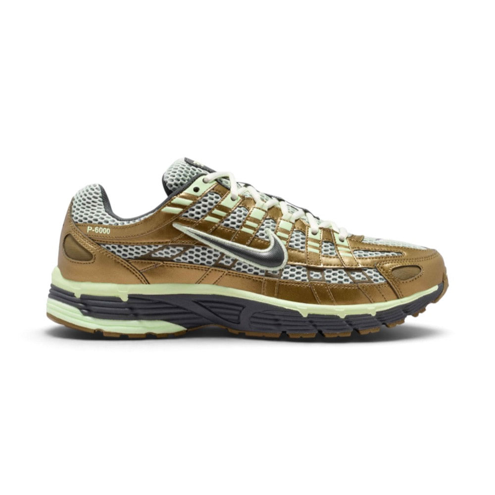 Highlights the early-2000s lateral silhouette featuring the Olive Flak textile mesh upper, layered Jade Aura and Anthracite leather cage overlays, moulded Nike Swoosh with Barely Volt trim, lifted foam midsole, and black rubber outsole.