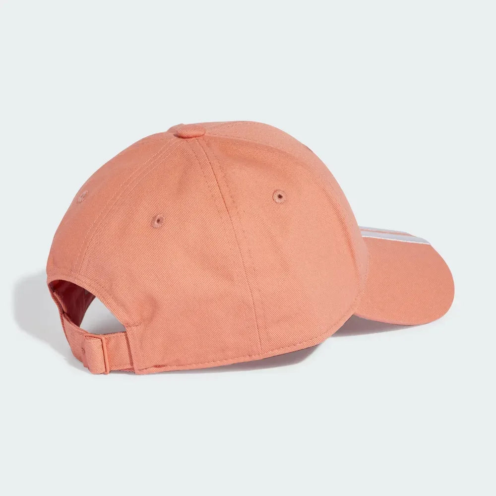 Peach-colored baseball cap on a light gray background