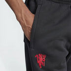 A close-up of the high-definition embroidery of the Manchester United Red Devil.
