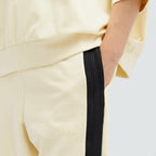 Details the high-definition finish of the texturised logos on the front and thigh.