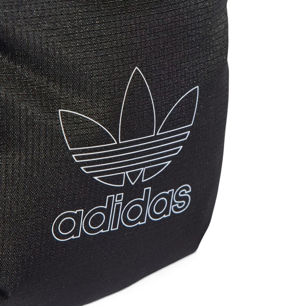 Details the premium technical micro-grid structure of the 100% recycled ripstop weave and the precision double-stitching running along the borders.