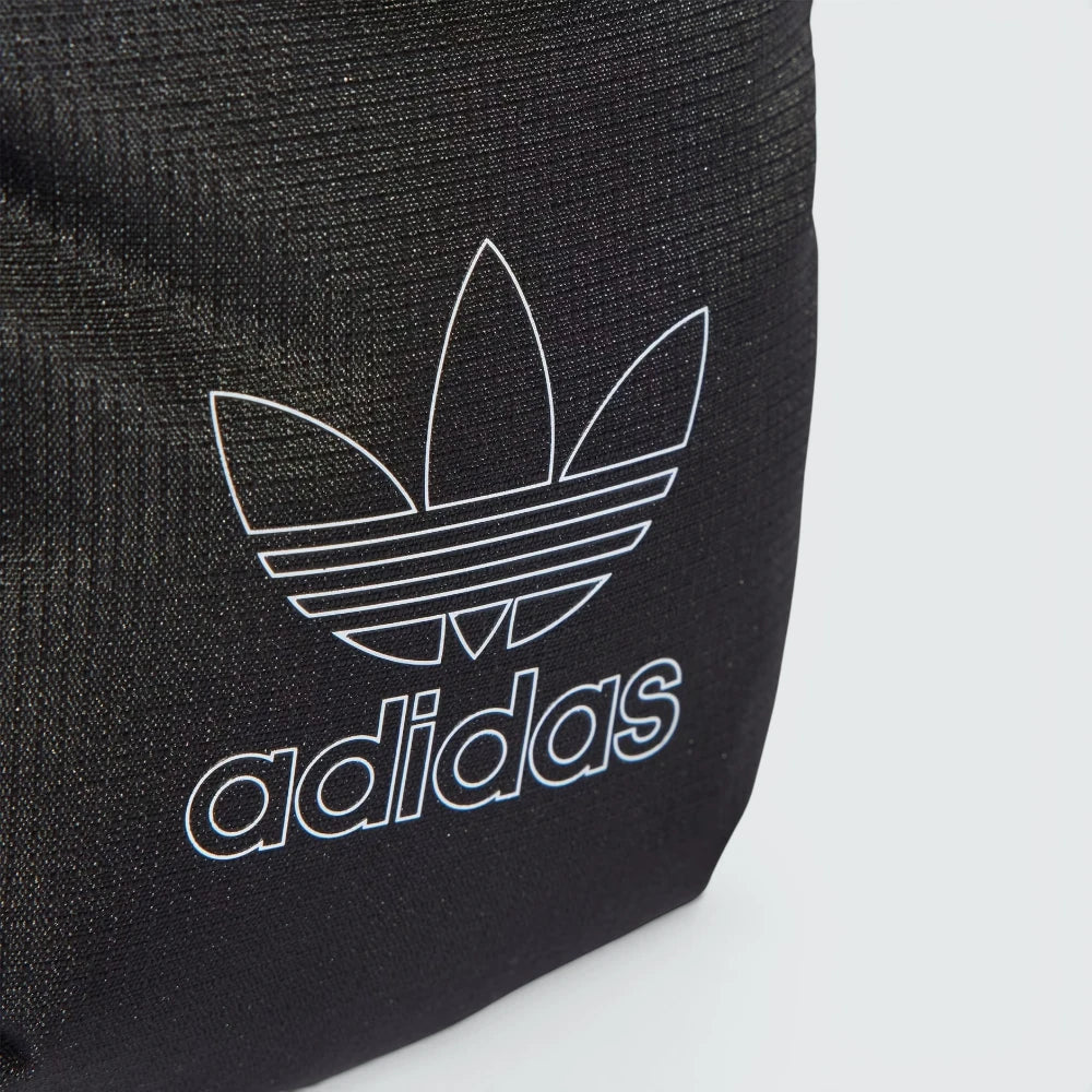 Details the premium technical micro-grid structure of the 100% recycled ripstop weave and the precision double-stitching running along the borders.