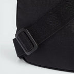 Emphasising the robust stitching lines bonding the heavy-duty D-ring loops to the side casing for maximum tear defence.