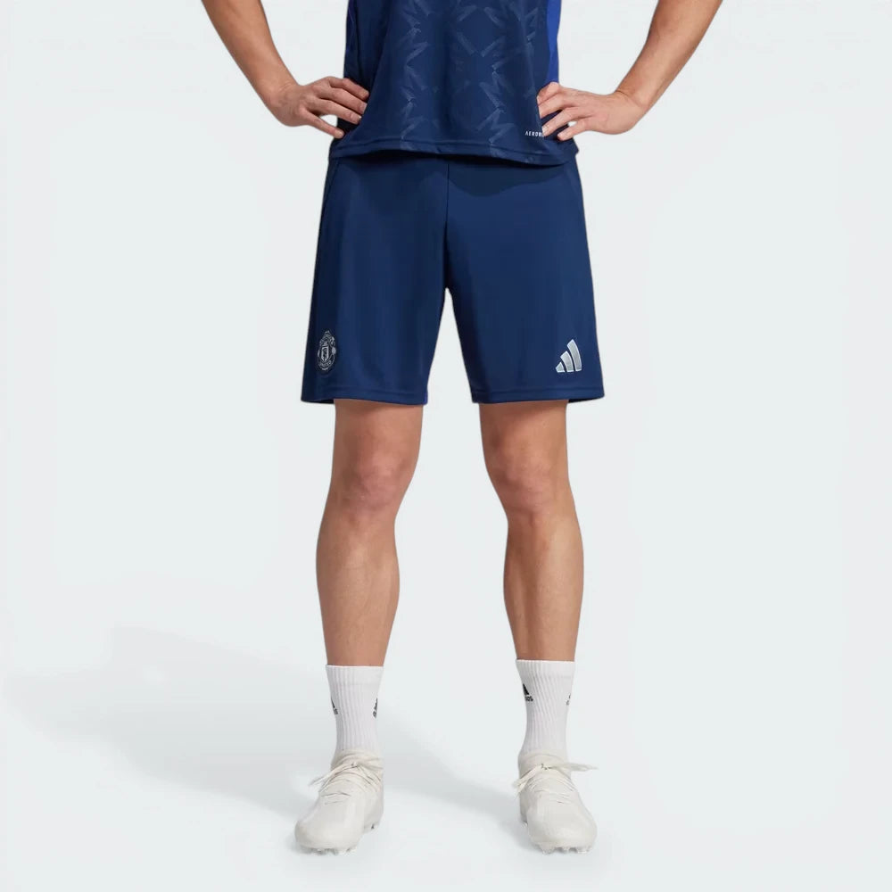 Looking at the front featuring the Manchester United crest and the embroidered adidas 3 Stripes Logo. 