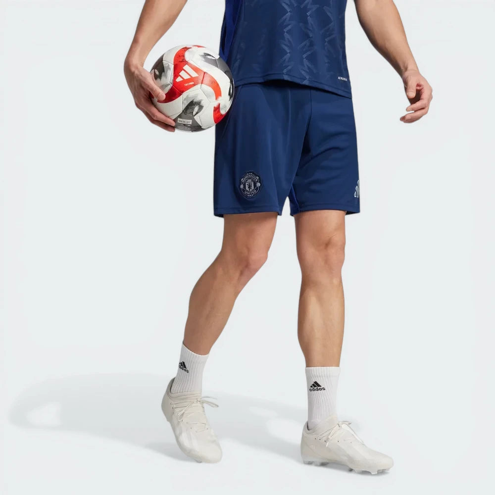 The Night Indigo away shorts, highlighting the embroidered Manchester United shield. Main image