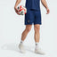The Night Indigo away shorts, highlighting the embroidered Manchester United shield.