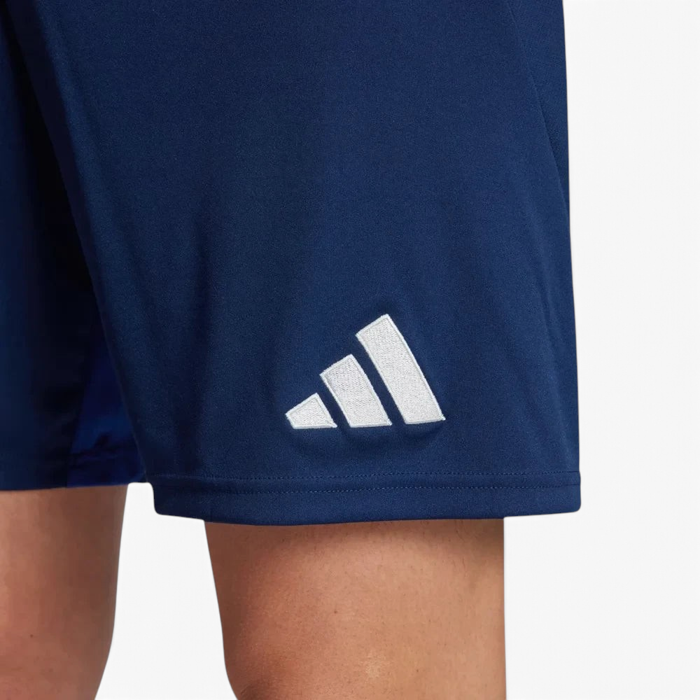 Navy blue shorts with a white Adidas logo on a light gray background