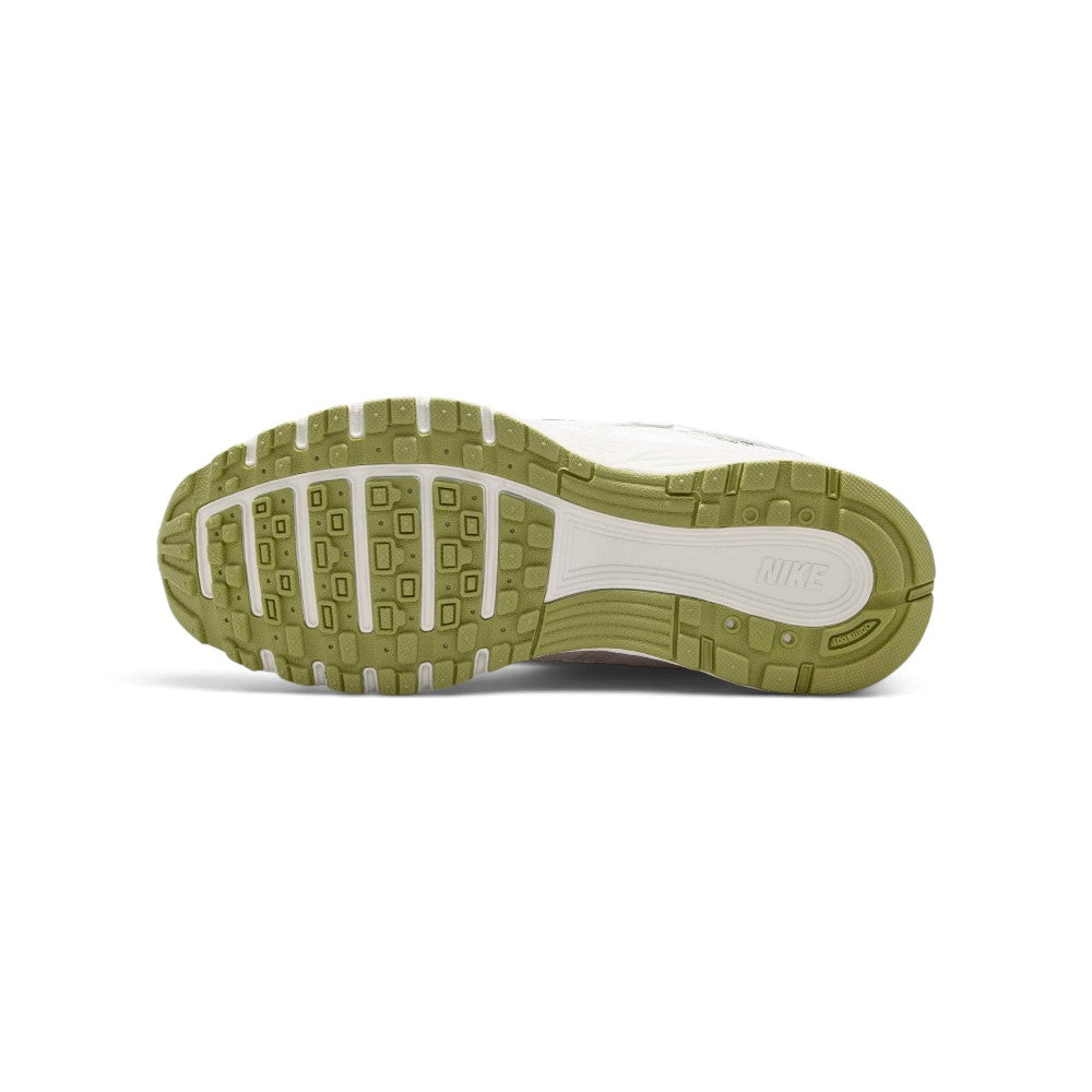 Displays the full-length black and olive rubber outsole, showcasing the waffle-inspired multi-directional grip lugs, forefoot flex grooves, and central Nike branding.