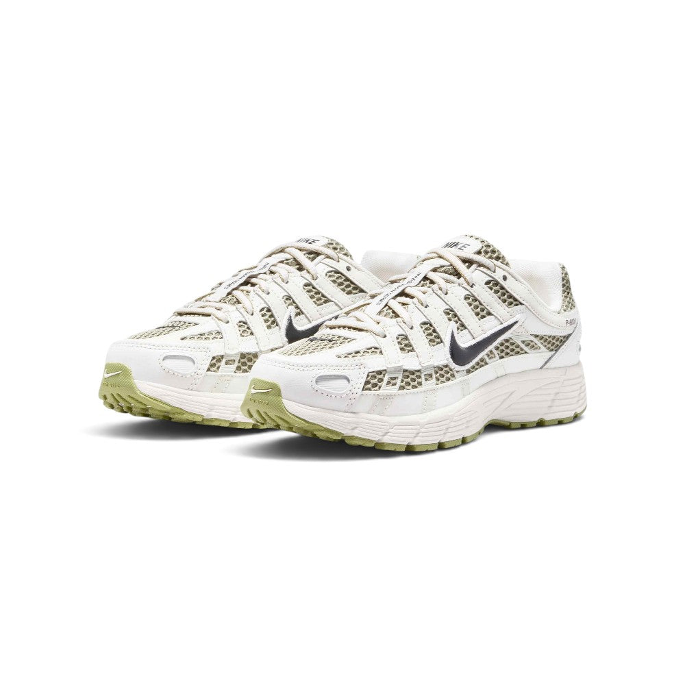 Emphasising the low-slung, athletic stance of the trainers and the rich visual harmony between the Neutral Olive mesh underlays and vintage Sail leather overlays.