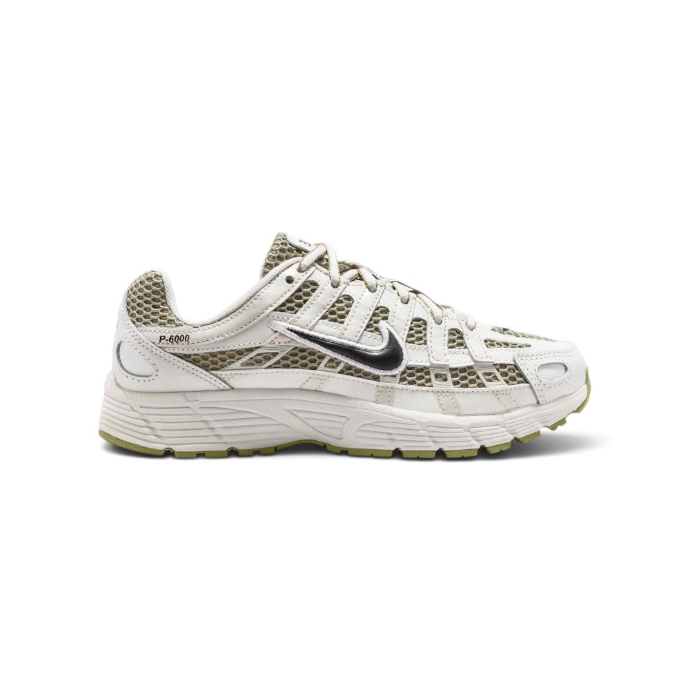 Highlights the early-2000s lateral silhouette featuring Sail leather horizontal and vertical overlays sweeping over Neutral Olive airy mesh, a black outlined Nike Swoosh, Sail foam midsole, and a black rubber outsole.