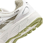 Highlights the "unreal" clean finish where the sculpted Sail foam midsole meets the grooved black rubber outsole tread and olive midfoot cage.