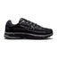 Capturing the 2000s retro running silhouette, detailing the black open-mesh upper, horizontal and vertical anthracite leather overlays, dimensional moulded black Swoosh, sculpted black foam midsole, and dark rubber outsole edge.