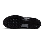 Focusing on the durable full-length black rubber outsole featuring waffle-inspired lug segments, forefoot flex grooves, and Pegasus-inspired traction pods, showcasing the grip matrix engineered for a successful tackle of city pavements, tarmac, and indoor flooring.