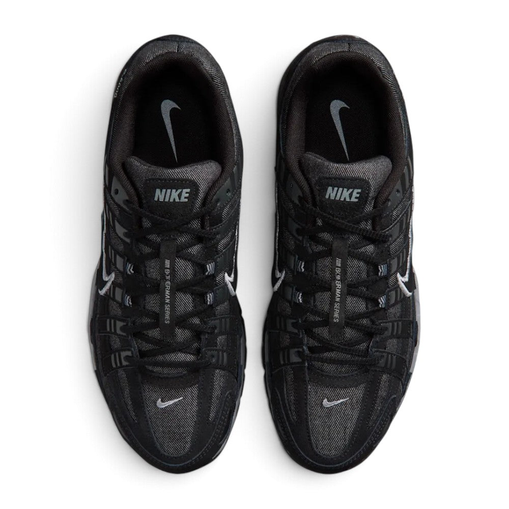 Highlighting the symmetrical central lacing throat, flat black laces, "Bowerman Series" branded tongue webbing, padded collar lining, and cushioned sockliner, demonstrating the upper template constructed for a comfortable "locked-in" fit.