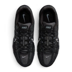 Highlighting the symmetrical central lacing throat, flat black laces, "Bowerman Series" branded tongue webbing, padded collar lining, and cushioned sockliner, demonstrating the upper template constructed for a comfortable "locked-in" fit.